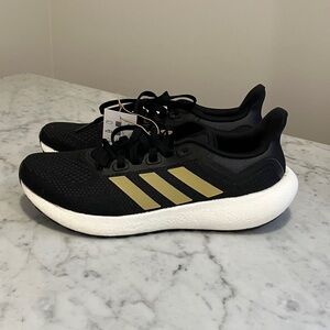 Adidas women’s Pureboost Jet in black and gold